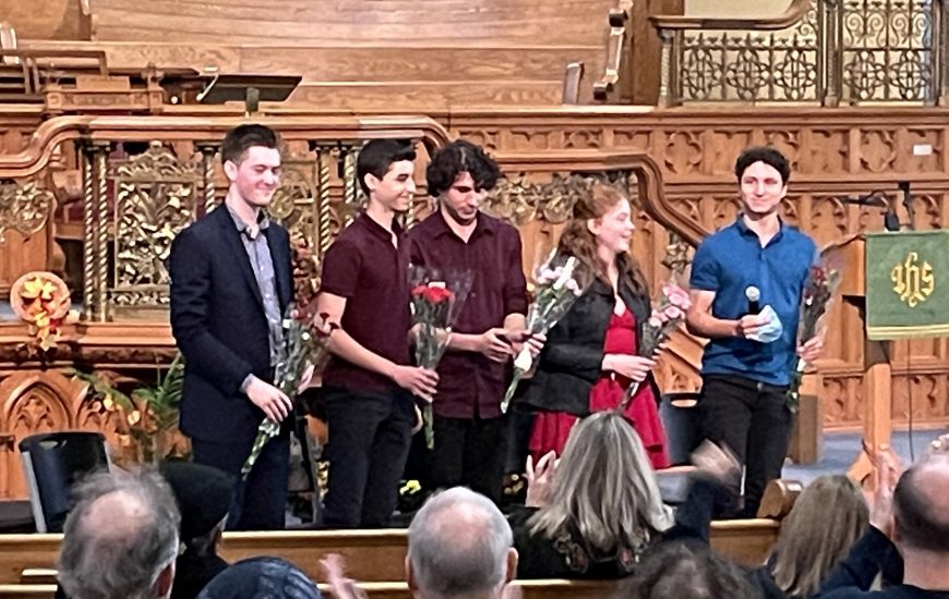 Youth performers after receiving flowers following performance.